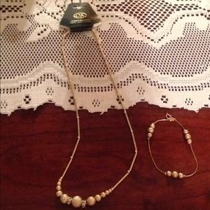 Gold layered necklace 20" with matching bracelet.